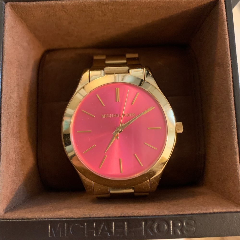 Pink faced gold Michael Kors women’s watch